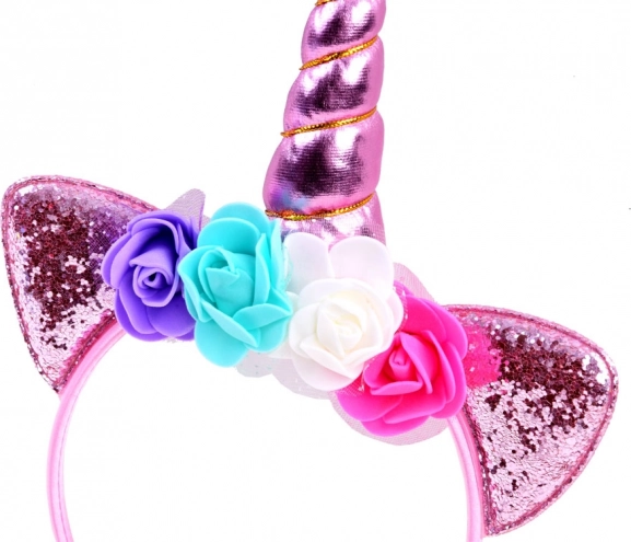Glittery horn and floral decoration