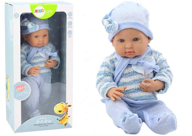 Baby Doll With Blue Sweater And Scarf