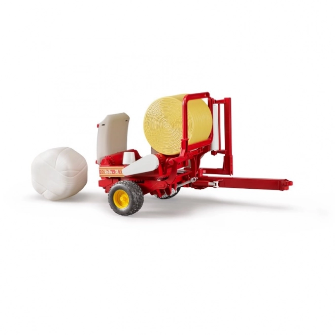 Round Baler with White and Yellow Bale