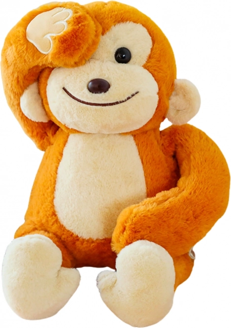 Scimmietta di peluche con magneti marrone 23 cm