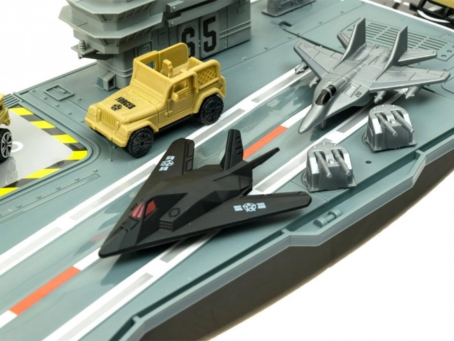 Large Military Aircraft Carrier with Planes and Vehicles