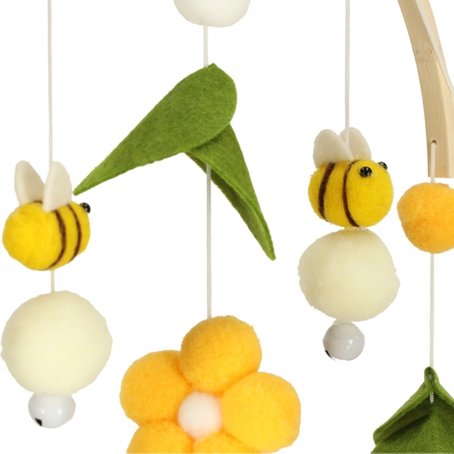 Wooden crib mobile with plush bee and flower hanging toys