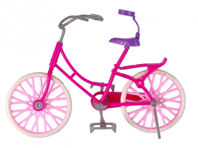 Doll on Pink Bicycle