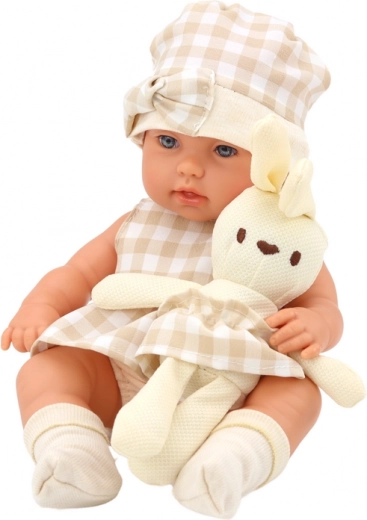 Realistična punčka s plišastim zajčkom