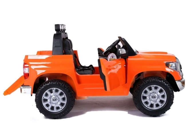 Battery Operated Orange Toyota Tundra Ride-On Car