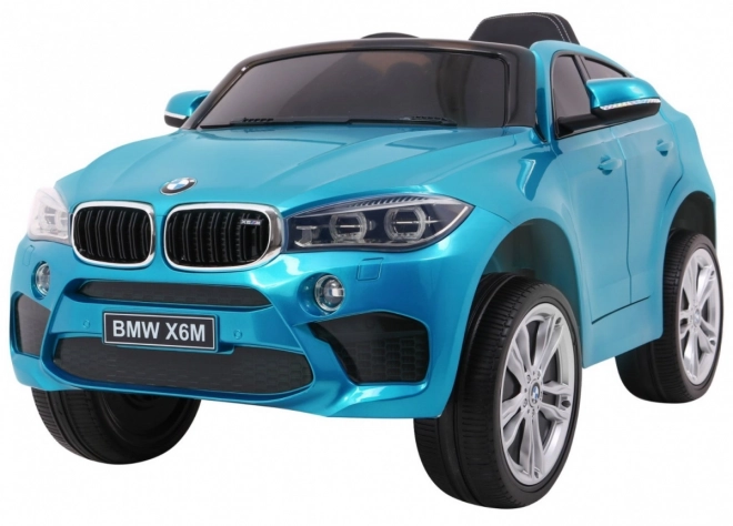 Mașină electrică pentru copii BMW X6M vopsită + telecomandă + EVA + pornire lentă + audio + LED – Modré
