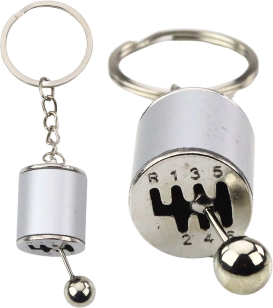 Metalen sleutelhanger in de vorm van een handgeschakelde versnellingsbak, zilver