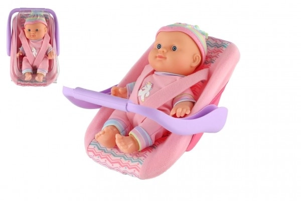 Doll With 20 Cm Plastic Body In Carrier/Car Seat