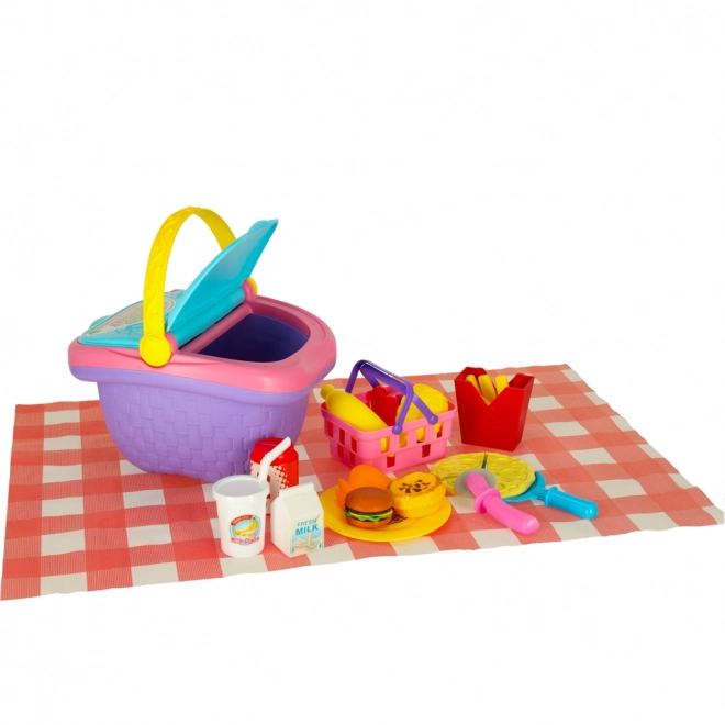 Cestino da picnic con frutta e succhi