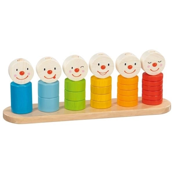 Puzzle with Numbers and Faces on Pegs