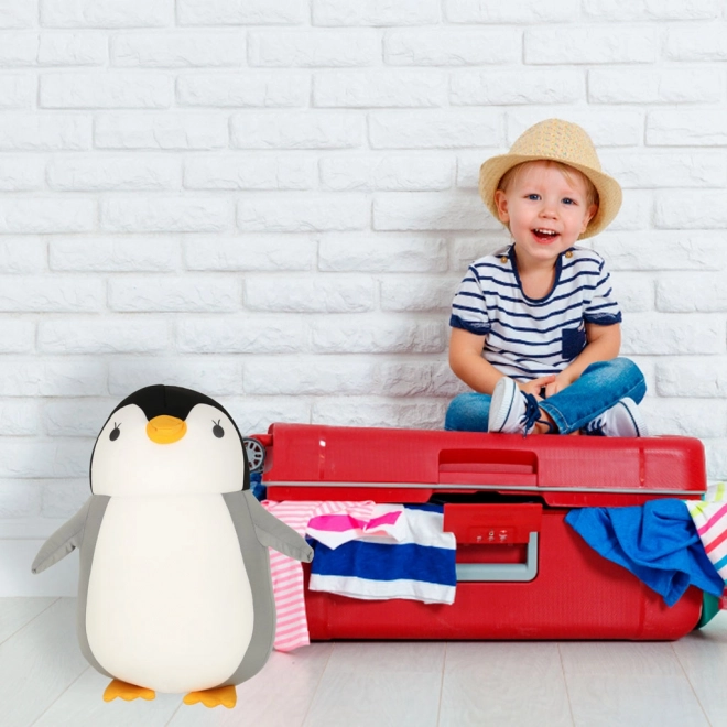 Coussin de voyage 2 en 1 en forme de croissant et peluche pingouin