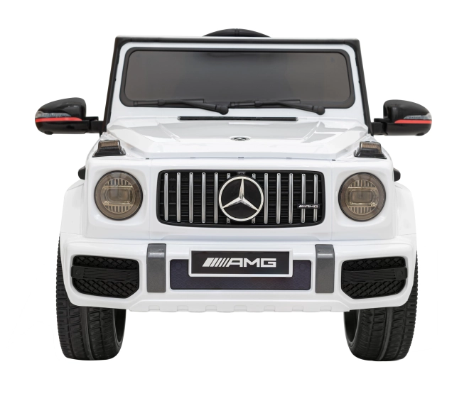 Mercedes AMG G63 for kids white + remote control + MP3 LED + slow start + EVA + belts