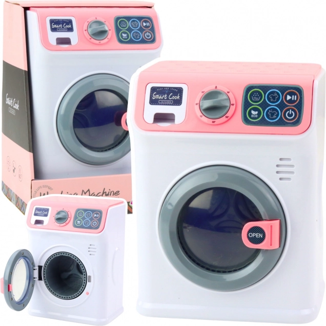 Children's toy washing machine with rotating drum in white-pink