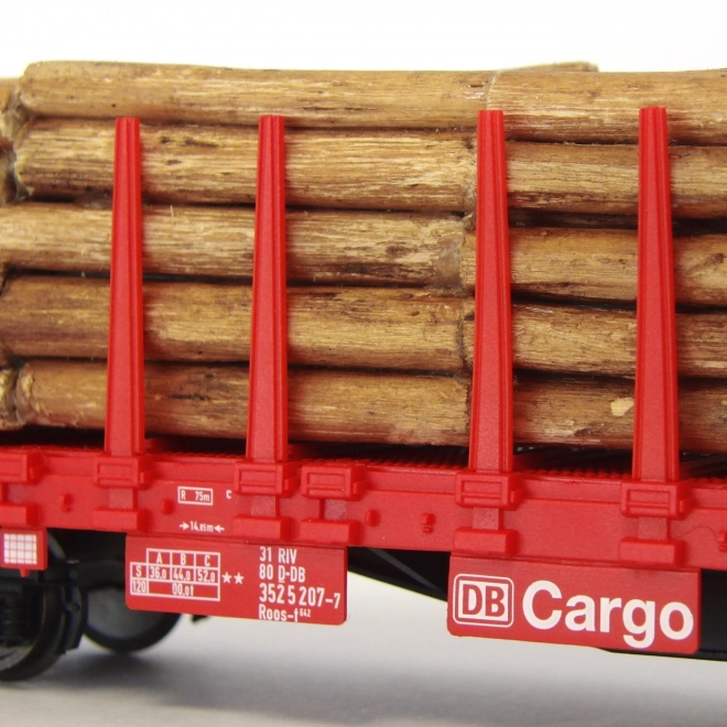 Piko flat wagon with stakes and wood load