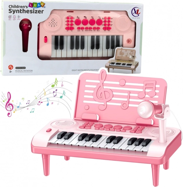Electronic kids’ mini piano with microphone and sheet stand, pink