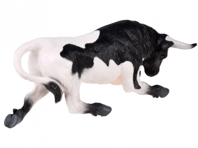 Black and White Bull Figurine Ready to Charge