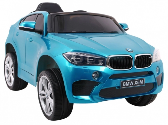 Mașină electrică pentru copii BMW X6M vopsită + telecomandă + EVA + pornire lentă + audio + LED – Modré