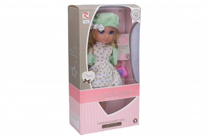 doll with handbag, cap and sound effects 36 cm