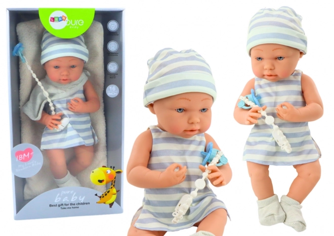 Baby Doll in White and Blue Outfit with Hat and Pacifier