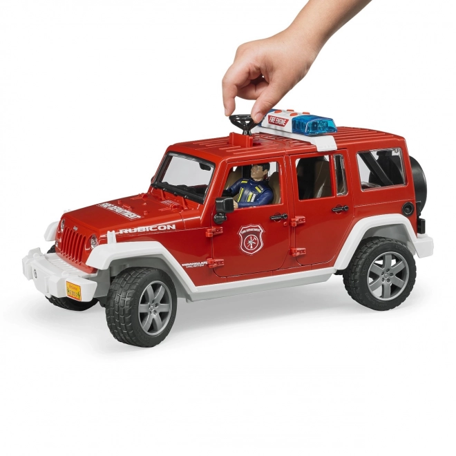 Bruder Red Fire Jeep Wrangler with Firefighter Figure and Accessories