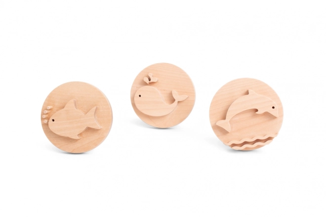 Zandstempels met motieven van zeedieren