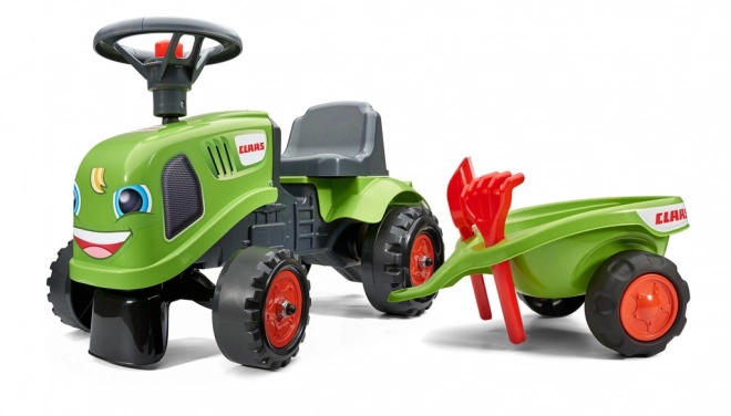 ride-on toy tractor with trailer and gardening tools