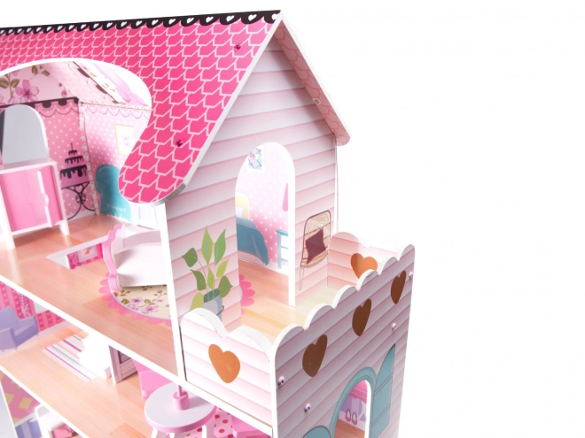 wooden dollhouse with pink LED lights