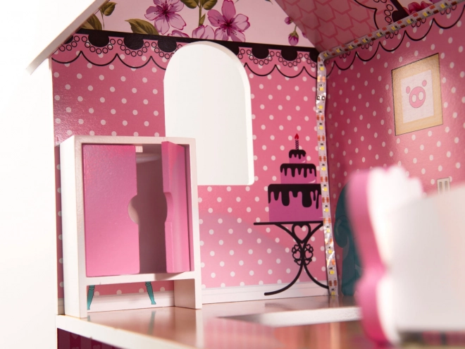 wooden dollhouse with pink LED lights