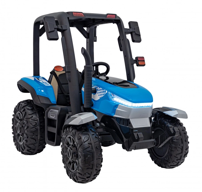 Kindertraktor mit blauem Anhänger
