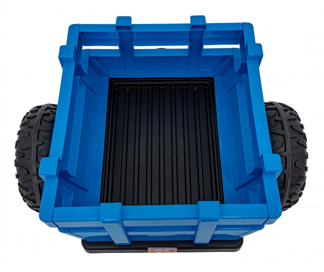 Kindertraktor mit blauem Anhänger