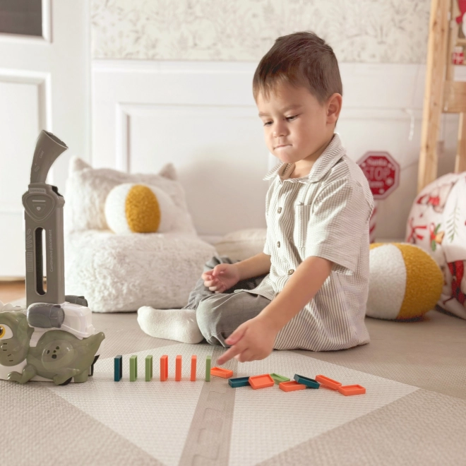 Dinosauro verde interattivo WOOPIE con trenino elettrico e domino