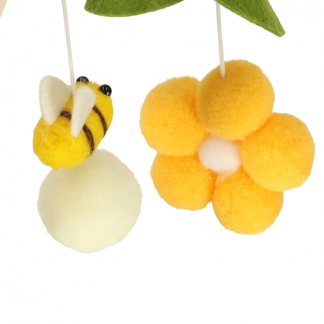 Wooden crib mobile with plush bee and flower hanging toys