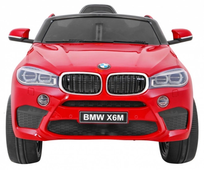 Mașină electrică pentru copii BMW X6M vopsită + telecomandă + EVA + pornire lentă + audio + LED – Červené