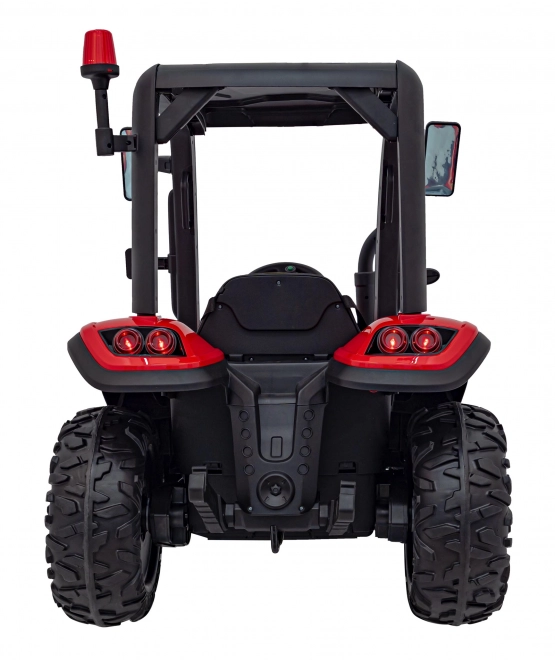 Traktor s přívěsem červený
