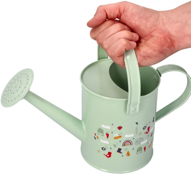 Metal watering can with spring motif