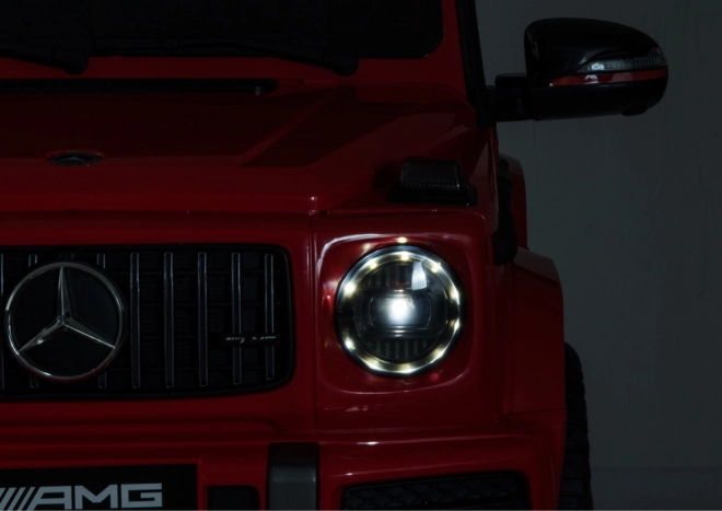 Children's battery-powered car Mercedes G63 red