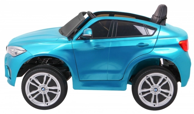 Mașină electrică pentru copii BMW X6M vopsită + telecomandă + EVA + pornire lentă + audio + LED – Modré