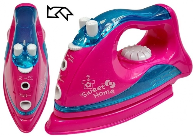 Set da stiro rosa con ferro da stiro e appendini