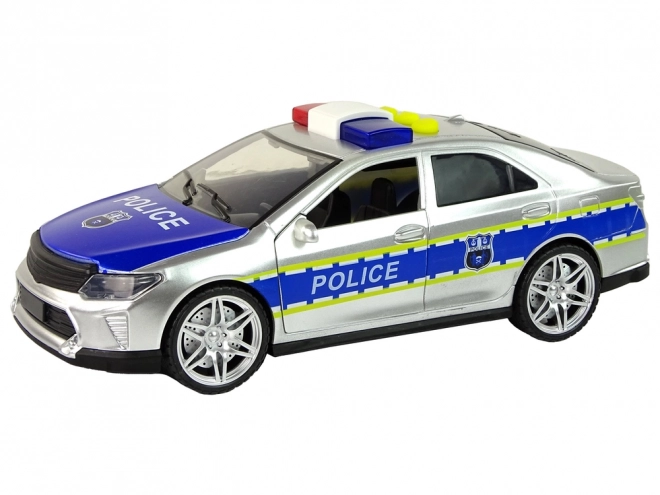 Police Car Toy with Friction Drive Sounds and Lights