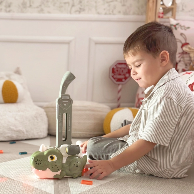 Dinosauro verde interattivo WOOPIE con trenino elettrico e domino