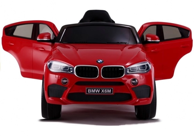 Battery-Powered BMW X6 Red Ride-On Car