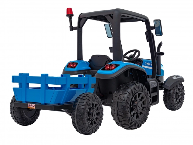 Kindertraktor mit blauem Anhänger