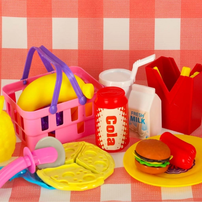 Cestino da picnic con frutta e succhi