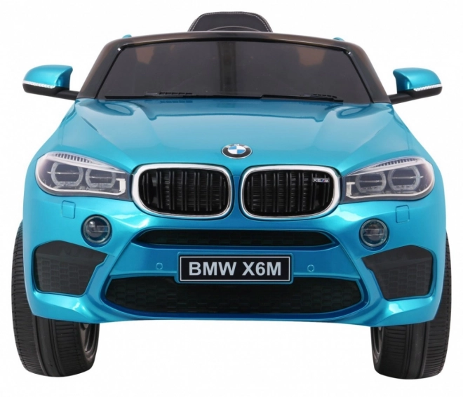 Mașină electrică pentru copii BMW X6M vopsită + telecomandă + EVA + pornire lentă + audio + LED – Modré