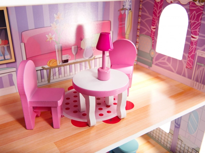 wooden dollhouse with pink LED lights