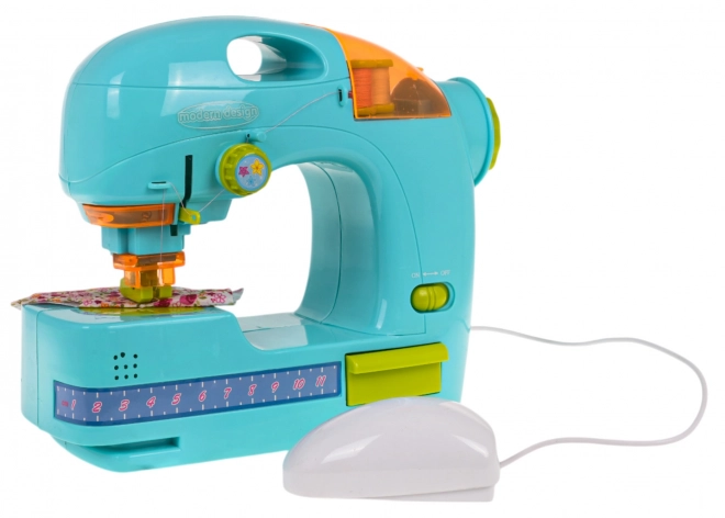 Interactive Blue Sewing Machine with Accessories