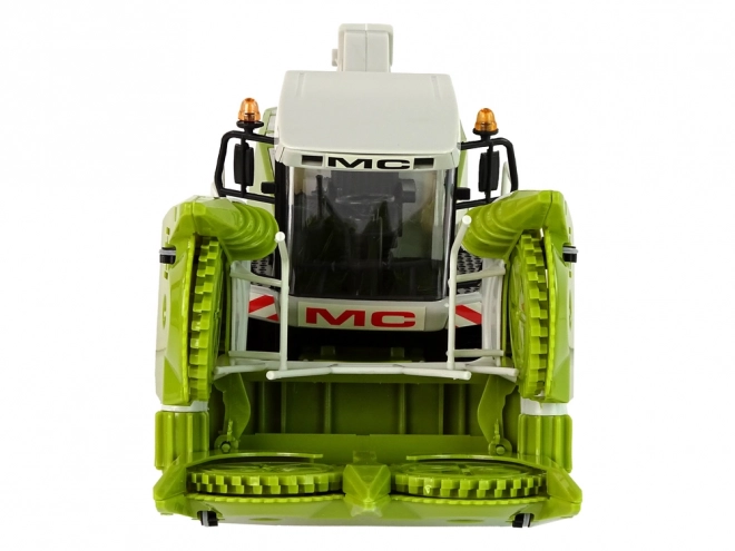 Large Green Harvester with Movable Parts