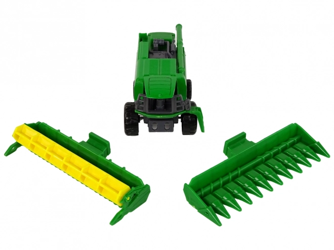 Green and Yellow Toy Farm Tractor with Seeder