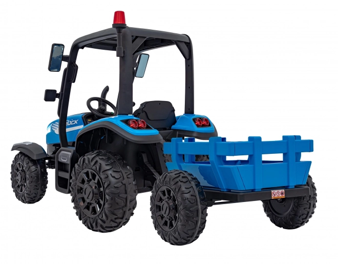 Kindertraktor mit blauem Anhänger