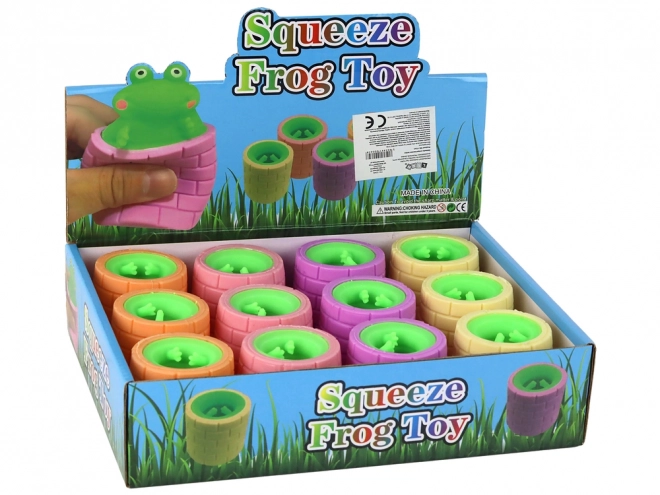 Stress Relief Green Frog Toy Jumping From Barrel